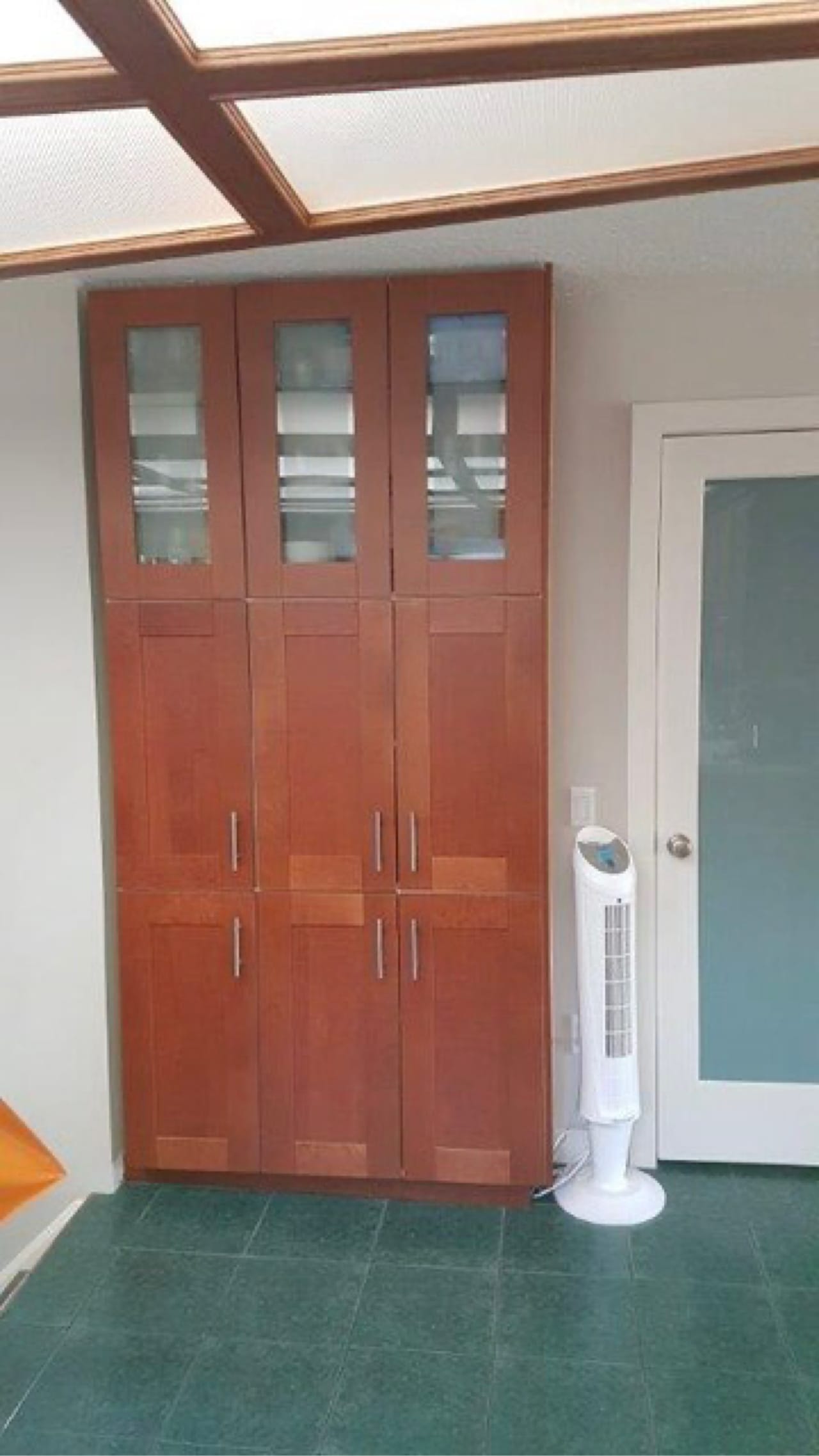 The three small pantry cabinets in the previous kitchen layout did not provide enough storage space for the homeowners.