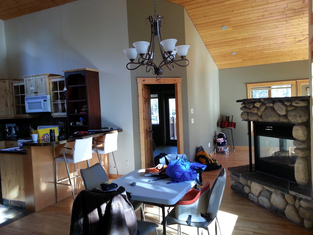 In the previous kitchen configuration, a tall pony wall was blocking the kitchen from the rest of the living space.